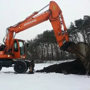 Doosan колесный экскаватор