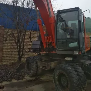 Продам колесный экскаватор Хитачи (HITACHI) ZX180W